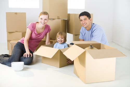 Removal team loading boxes and furniture for a move