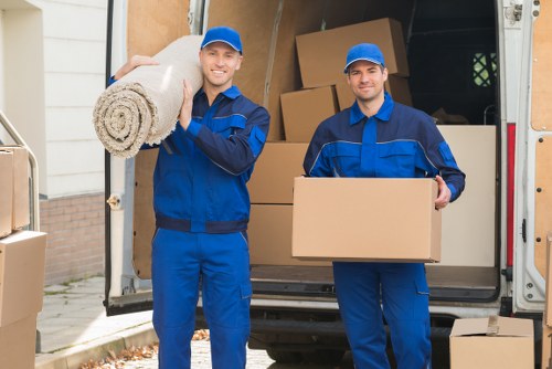 Movers transporting household items during a Southwark relocation