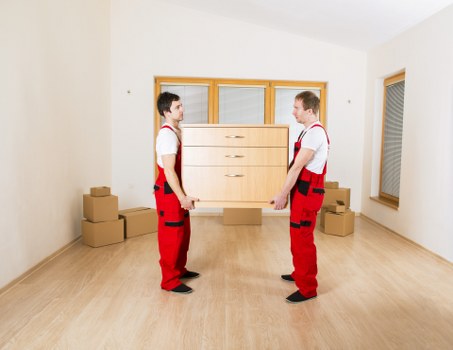 Quote planning for a Southwark home move with boxes and sofa